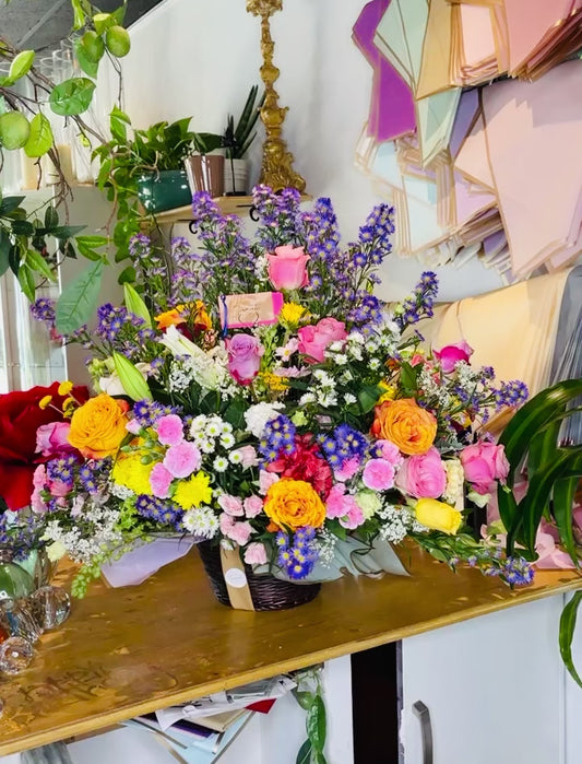 Peacock Blooms: A Colorful Floral Arrangement