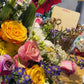 Peacock Blooms: A Colorful Floral Arrangement